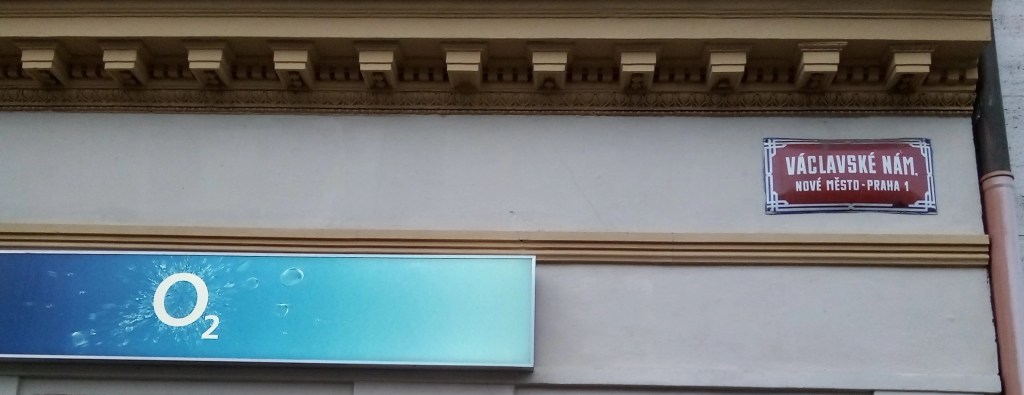 Photo of Prague street sign on O2 mobile phone shop