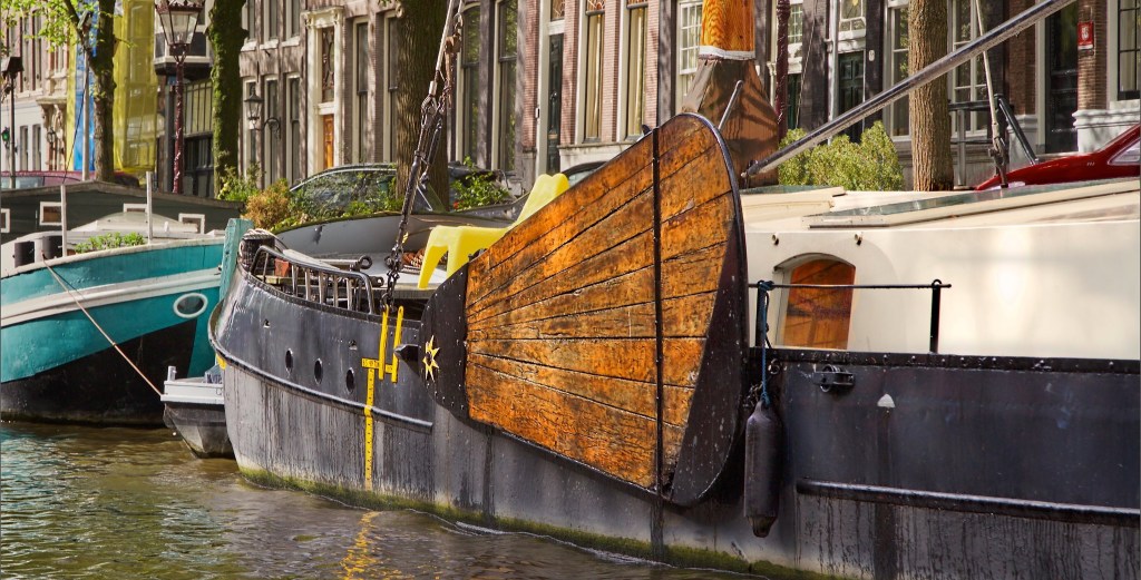 Photo of moored Dutch barge with leeboard raised