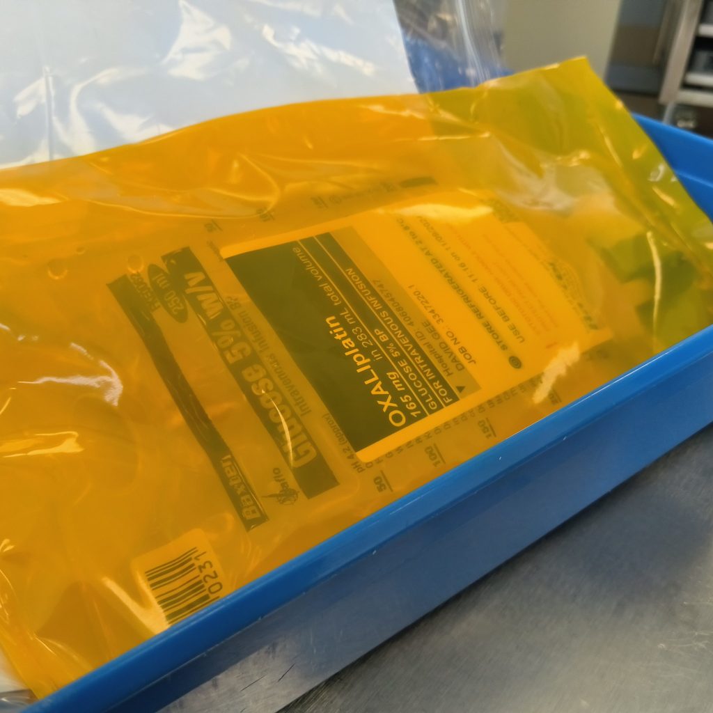 Photo of chemotherapy drug in yellow plastic bag